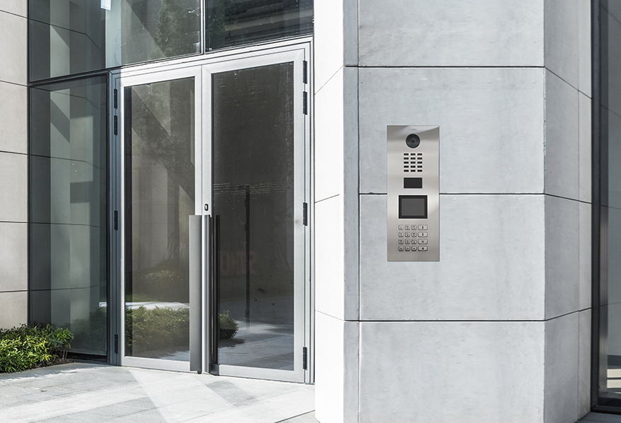 Video intercom and access control installed at a modern building entry